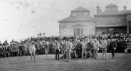 Golfers and spectators line up at St Andrews in 1876.