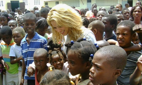 Shakira meets survivors of Haiti’s earthquake when her charity was building a school in the country. 