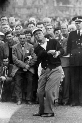 The gallery intently watch a shot made by Arnold Palmer as he competes in a qualifying round of the 1960 British Open.