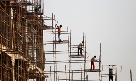 Construction workers in New Delhi, 2013.