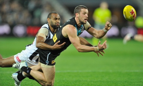 Port Adelaide captain Travis Boak fires off a handball in his side's 3-point win