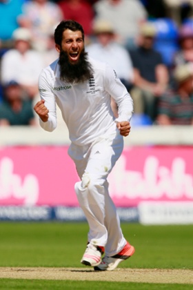 Moeen Ali celebrates the wicket.
