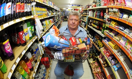 Nigel Dowdney inside his store. Photograph: Si Barber for The Guardian