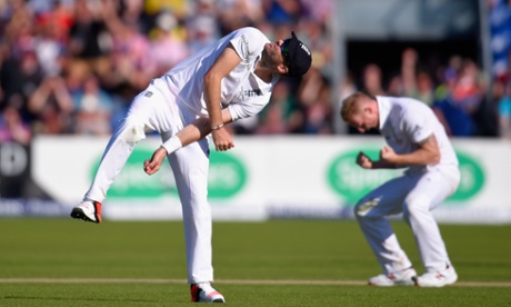 Jimmy Anderson celebrates after catching Australia batsman Adam Voges off the bowling of Ben Stokes, right.