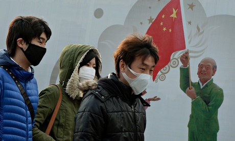 Chinese shoppers wear face masks due to