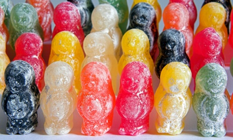 Jelly baby sweets standing in rows
