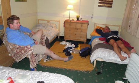 Dead on their feet: Tom and Alan collapse at the end of the first long day at a B&B in Cocking.