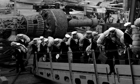 Not quite a catwalk: sailors of the British Navy board the aircraft carrier Warrior at Portsmouth.
