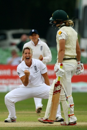 England's Katherine Brunt celebrates taking the wicket of Australia captain Meg Lanning for a duck.