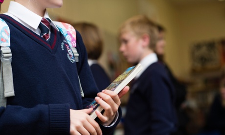 Pupil wearing school uniform