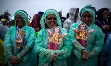 Catholics wait for Pope Francis to visit Manila.