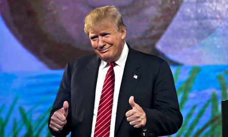 Republican Presidential candidate Trump reacts as he speaks at the 2015 FreedomFest in Las Vegas