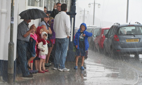 A soaking in Sidmouth - Summer rain stops play by davethebrave54.
