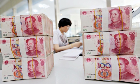 stacks of yuan: No one knows why it has been devalued