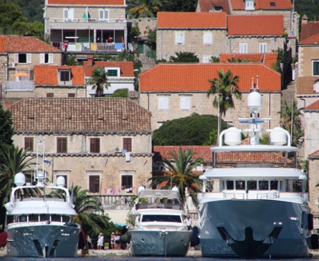 Houses and boats. For me, one of the defining features of the little town of Cavtat was the ever-changing line-up of fancy yachts. This shot exploits the compression of the telephoto lens to pack together the boats and the houses of the town (which fortunately slopes upward away from the water's edge). The effect is accentuated by cropping the picture so as to barely acknowledge the presence of the sea.