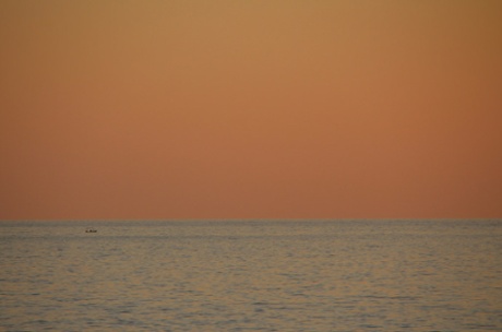 Sunset in orange and blue. This is another almost abstract shot, dominated by the rectangles of the orange sky and the blue of the sea. The tiny silhouetted boat adds drama and scale to the scene. I have deliberately composed the shot to show the boat entering the scene. I don’t think the photograph would work as well if the boat was in the centre of the picture.