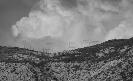 Pylons on the hill. To the untrained eye, this is just a picture of electricity pylons on a mountain ridge. But the particular formation of the pylons makes them look as if they are marching towards us. The clouds piling behind add more structure and drama, which I have heightened by switching to black and white. Well, that’s what I choose to see in any case. My wife begs to differ.