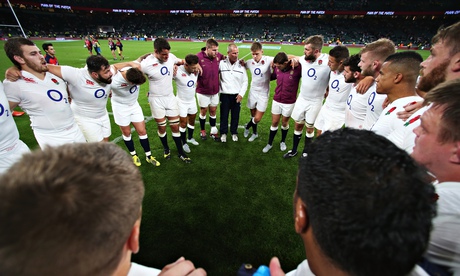 Stuart Lancaster, the head coach of England, talks to his team after the QBE match against France