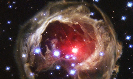 NASA/Rex Shutterstock Mandatory Credit: Photo by NASA/REX Shutterstock (4673564i) Image from NASA's Hubble Space Telescope shows never-before-seen spirals of dust swirling across trillions of miles of interstellar space. This image, obtained with the Advanced Camera for Surveys on February 8, 2004, is Hubble's latest view of an expanding halo of light around a distant star, named V838 Monocerotis (V838 Mon).