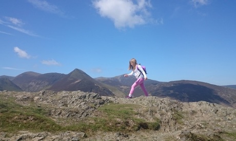 Reaching the summit of Catbells in Cumbria