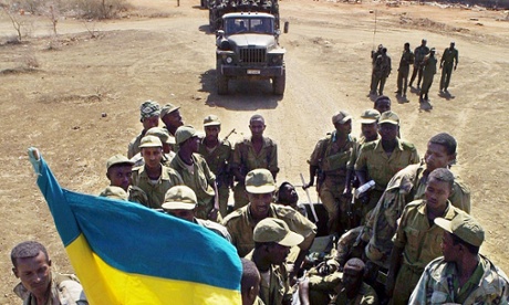 Ethiopian troops leave the Eritrean town of Shilalo in 2001 following a peace accord.