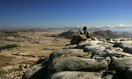 An soldier mans an observation post facing the Temporary Security Zone, on the Eritrean border in the Tigray region of Ethiopia, 2005.