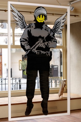 Banksy piece flying copper