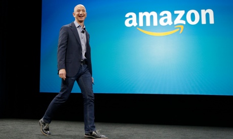 Amazon CEO Jeff Bezos walks on stage for the launch of the Amazon Fire Phone