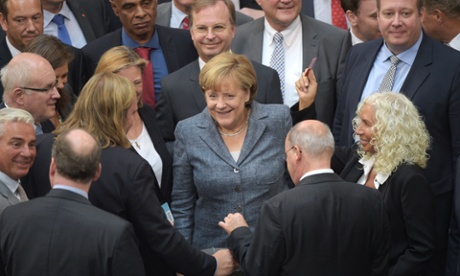 Smiles all round. Angela Merkel meets members of the German Bundestag.