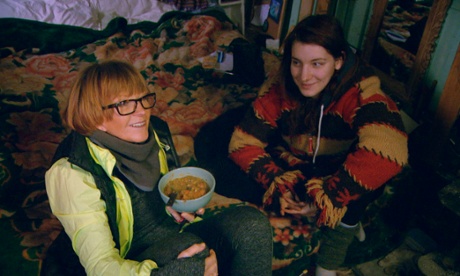 Anne Robinson enjoys a skip-surfed supper with Hannah, an eco-villager