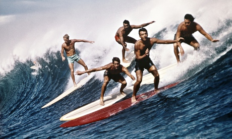 five men surfing