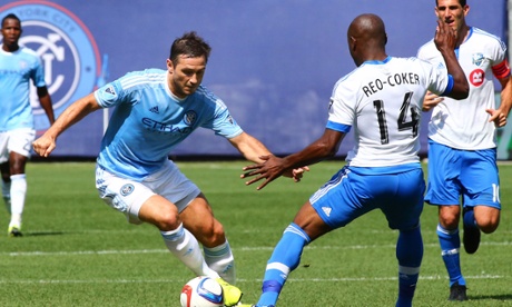 Frank Lampard takes on Nigel Reo-Coker during his New York City debut at Yankee Stadium.
