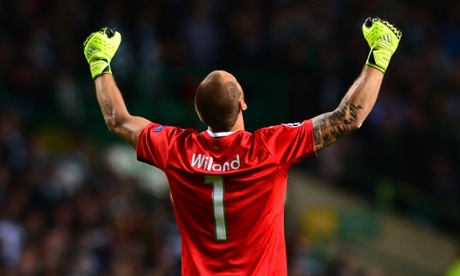 Johan Wiland of  Malmo celebrates after Jo Inge Berget's goal early in the second half against Celtic.