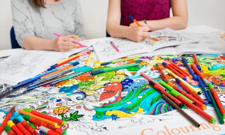 Women with colouring books