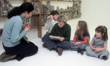 Children with a storyteller in a 'sculptured library' - part of a season at the Lyric Theatre, Hammersmith exploring visual and verbal languages