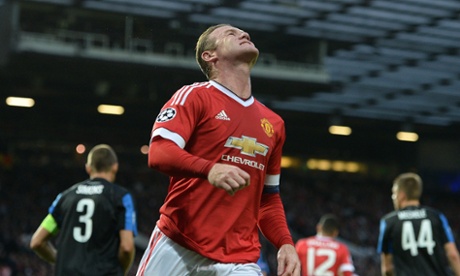 Manchester United's English striker Wayne Rooney gestures after a missed goal opportunity during the UEFA Champions League play off football match between Manchester United and Club Brugge at Old Trafford in Manchester, north west England, on August 18, 2015. AFP PHOTO / OLI SCARFFOLI SCARFF/AFP/Getty Images