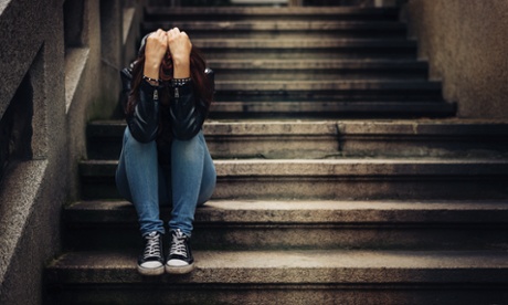 Girl upset on stairs