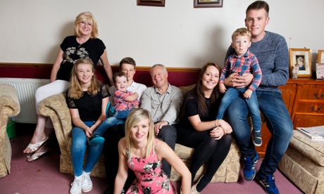 Laura Asbury (front) with her parents Jon and Carol, her four-year-old son Leo (brown hair), two brothers Chris (white shirt) and Andy (blue jumper), sister Alice, her brother Andy's fiance Heather (in black) and their two-year old son Josh.
