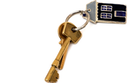 Keyring with house keys and a house-shaped charm