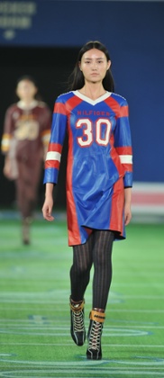 A model on the catwalk Tommy Hilfiger 30th anniversary fashion show, Beijing, China.