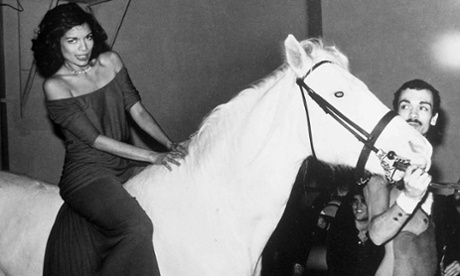 Giddy-up … Bianca Jagger on a white horse at Studio 54 in 1977.