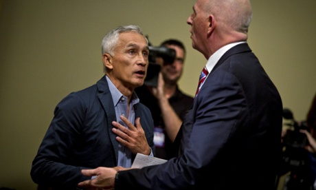 Jorge Ramos is escorted away after trying to ask Donald Trump a question.