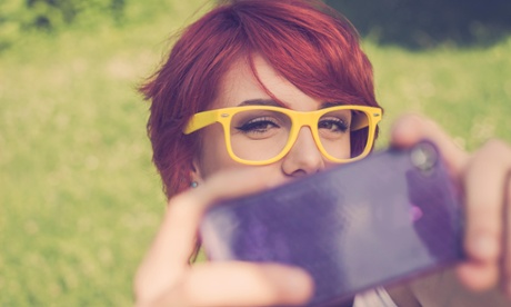 Young girl taking a selfie