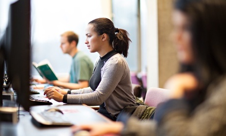 Woman working at computer screen