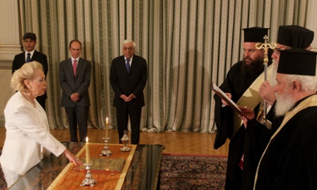 Vassiliki Thanou is sworn in as Greek prime minister at the Presidential Palace in Athens.