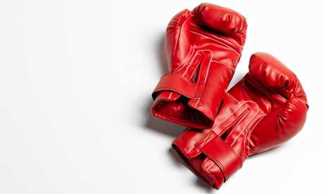 red boxing gloves on white background
