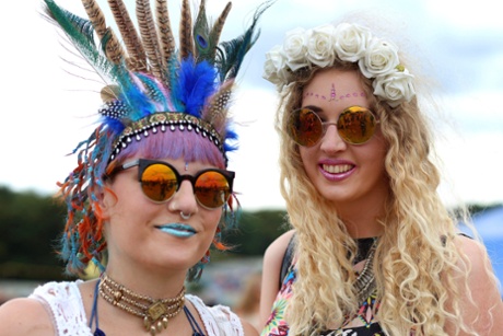 Ashton Brown, left and Alice Varney, right wear colourful attire at Leeds festival.