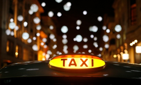 A London black cab available for hire.
