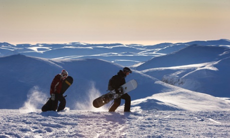Snowboarders at the summit of Cairngorm mountain in Scotland.
