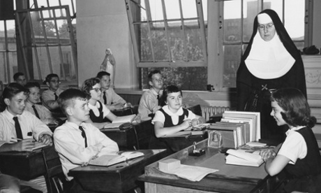 Nun teaching children